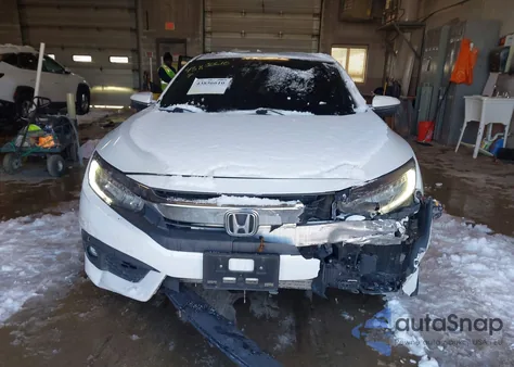 2018 Honda Civic Touring z USA, uszkodzony, nr VIN 19XFC1F93JE002590